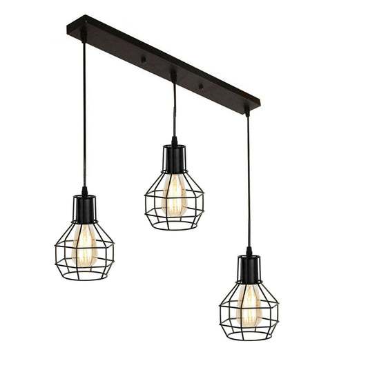 Three black open-frame cage shades on pendant bar for eclectic industrial interior