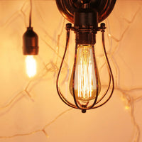 cage lamps licperron industrial wall sconce